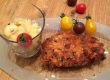 Hühnerschnitzerl in Cornflakes-Kürbiskern-Panier Hühnerschnitzerl in Cornflakes-Kürbiskern-Panier