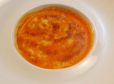 Zander mit Sauce von roten Paprika gratiniert