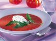 Paradeisrahmsuppe mit Rucolahaube