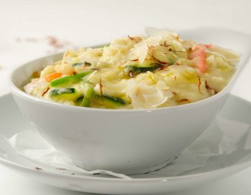 Safranrisotto mit Zucchini und Shrimps Safranrisotto mit Zucchini und Shrimps