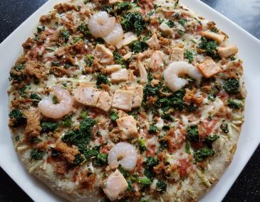Pizza mit Meeresfrüchten Pizza mit Meeresfrüchten