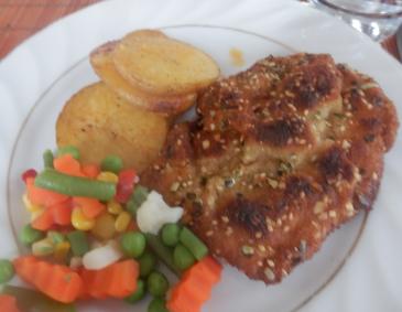 Schnitzel mit Sesam-Kürbiskernpanier Schnitzel mit Sesam-Kürbiskernpanier