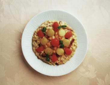 Risotto mit Tomaten, Topinambur und Kürbis Risotto mit Tomaten, Topinambur und Kürbis