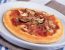 Pizza al prosciutto e funghi (Pizza mit Schinken und Pilzen)