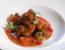 Schweinswadlgulasch mit Paradeisern
