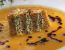 Kürbis-Tomatencremesuppe an knusprigem Kürbiskernbrot