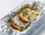Kabeljaufilet auf dem Gemüse-Früchtchen-Bett