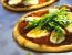 Pizza mit Mozzarella und Rucola