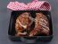 Spareribs in scharfer Schwarzbiermarinade