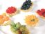 Törtchen mit Cremefülle und Obstbelag