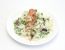 Truthahnmedaillons überbacken auf Erbsen-Champignon-Risotto