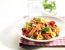Farfalle all Pesto Rosso mit gebratenen Putenbruststreifen, Zucchini und Auberginen