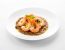 Handselektierte Shrimps mit Orangennudeln und Olivenjus