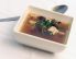 Wachtelconsommé mit Mu Err Pilzen