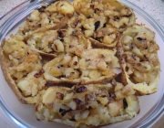 Knusprig gebackene, gefüllte Kartoffelhälften